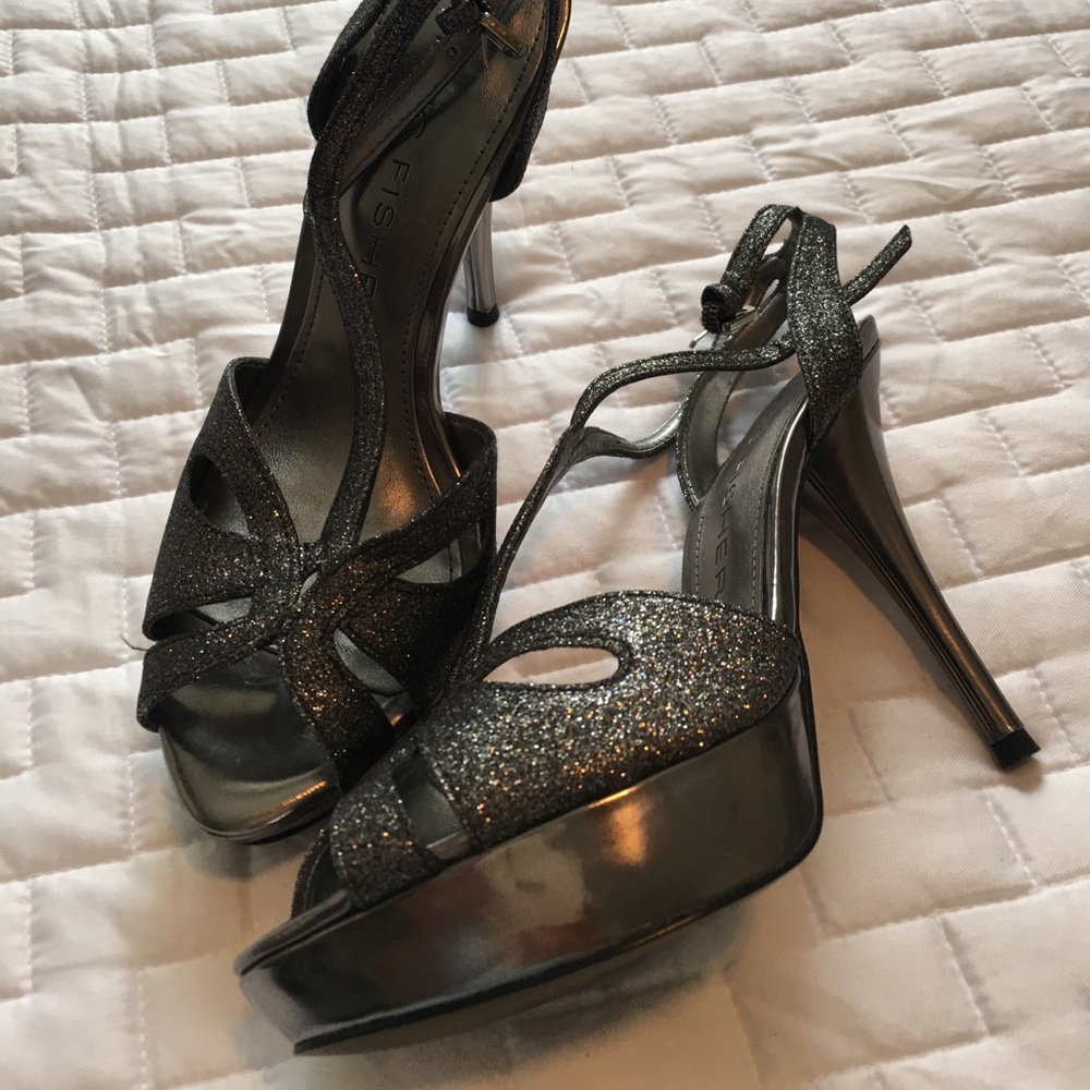 Brand new. Never worn. 3.5" heels.