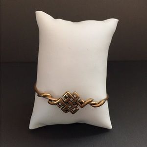 Gold endless knot Alex and Ani bangle