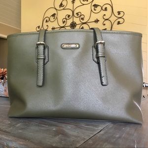 Used. Green Dana Buchman purse.