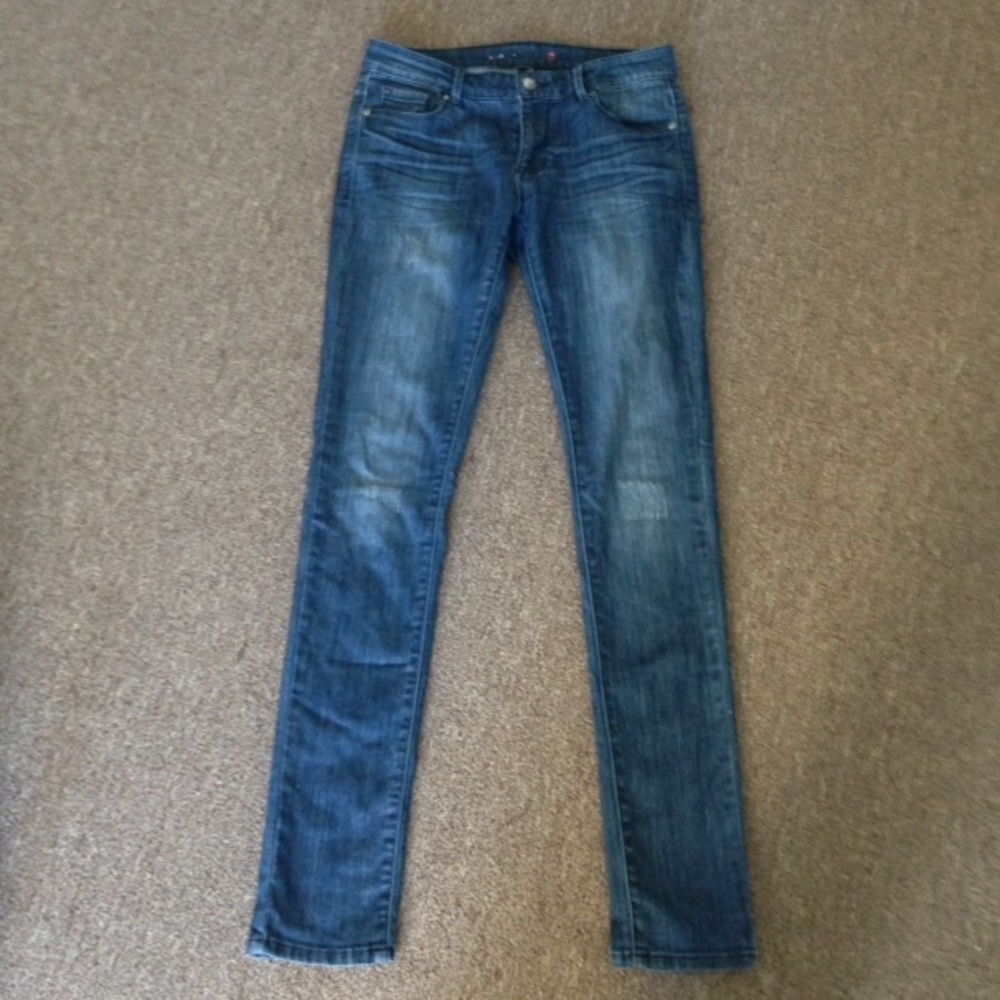 Denim blue Skinny jeans.With rips.