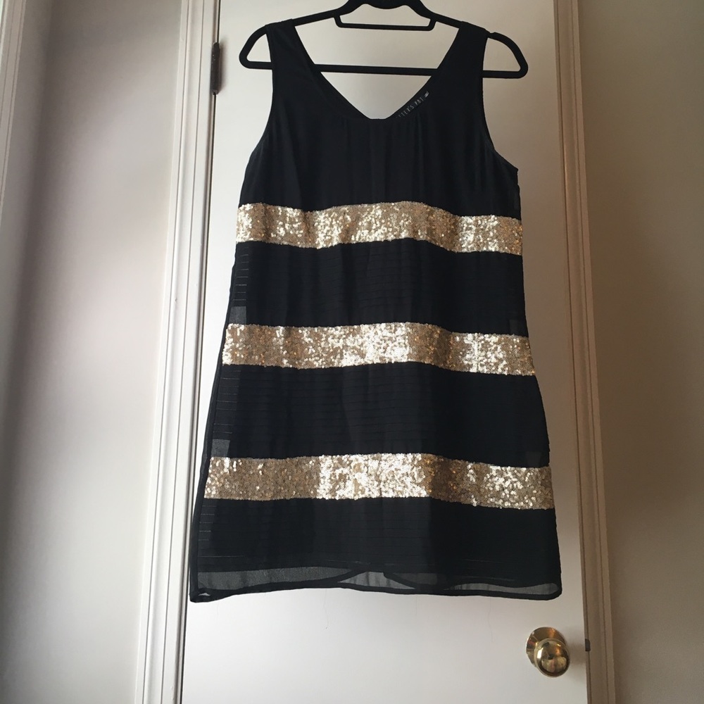 Black dress with gold sequin pattern