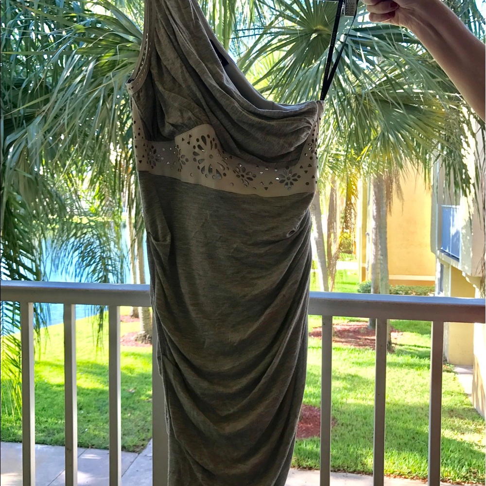 It's a tight-fitting, yet comfy grey dress