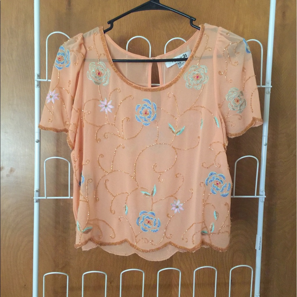 Peachy colored blouse