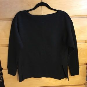 Loose black sweater