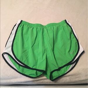 Lime green Nike Tempos