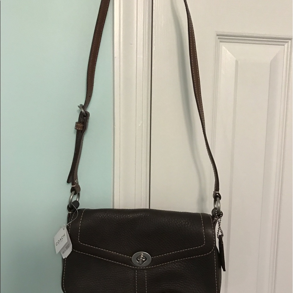 New. Coach brown shoulder bag. 5.5 L x 9.5 W