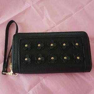 Adorable wristlet wallet with flowers .