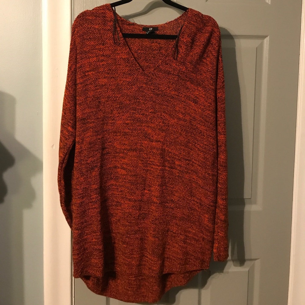 Orange and black knit sweater
