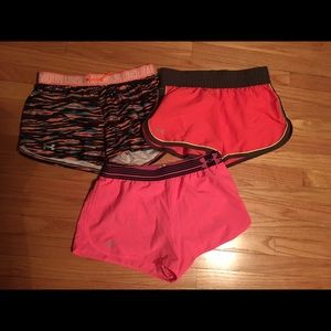 3 pairs of Under Armour workout shorts.