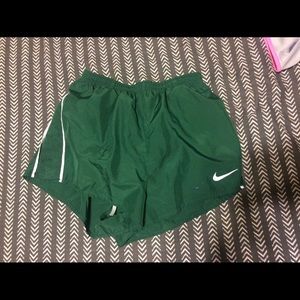 Dark green Nike athletic shorts