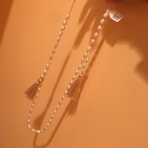 Gorgeous light pink tassel necklace