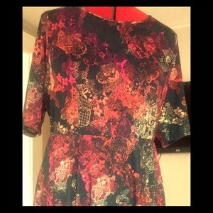 Abstract neon fit and flare dress by Triste