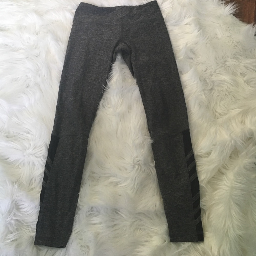 Gray leggings with mesh at the bottom