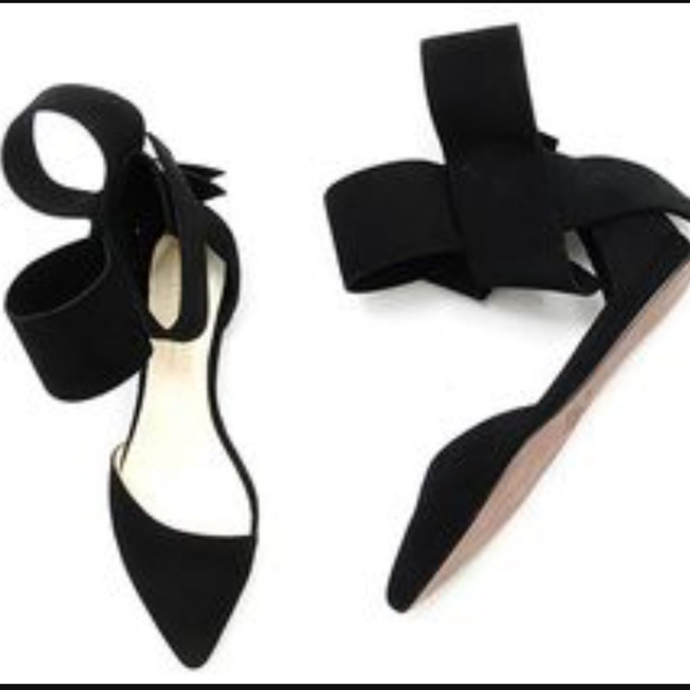 Aminah Abdul Jillil black bow flats