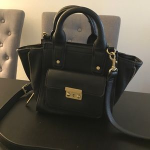 Black and gold Philip Lim x Target crossbody bag