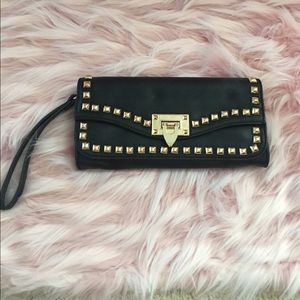 Black clutch with gold studs