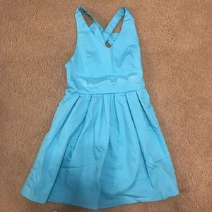 Light blue mini dress with bow on back