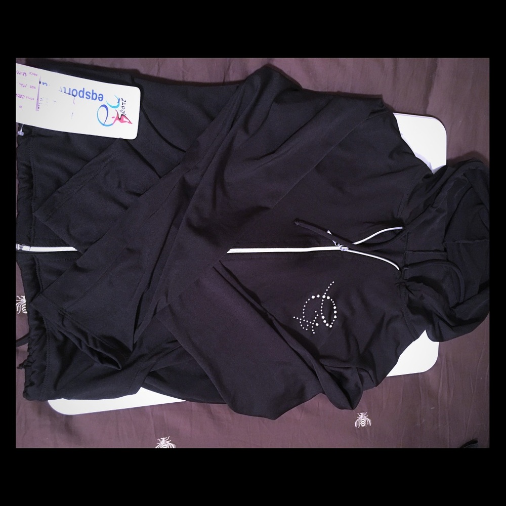 Black workout jacket by Equilibrium Activewear