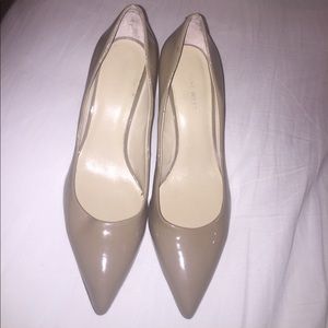 Patent leather, tan high heels.