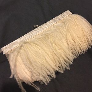 Feathered clutch