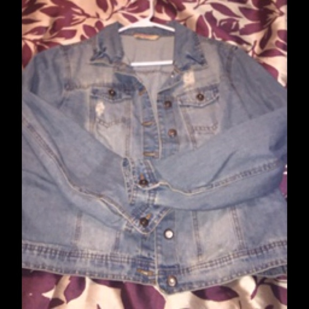 Distressed jean jacket