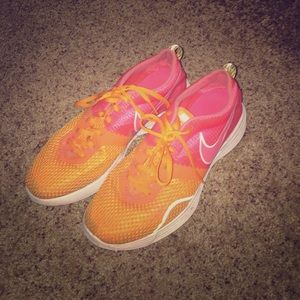 Nike pink and orange tennis shoes