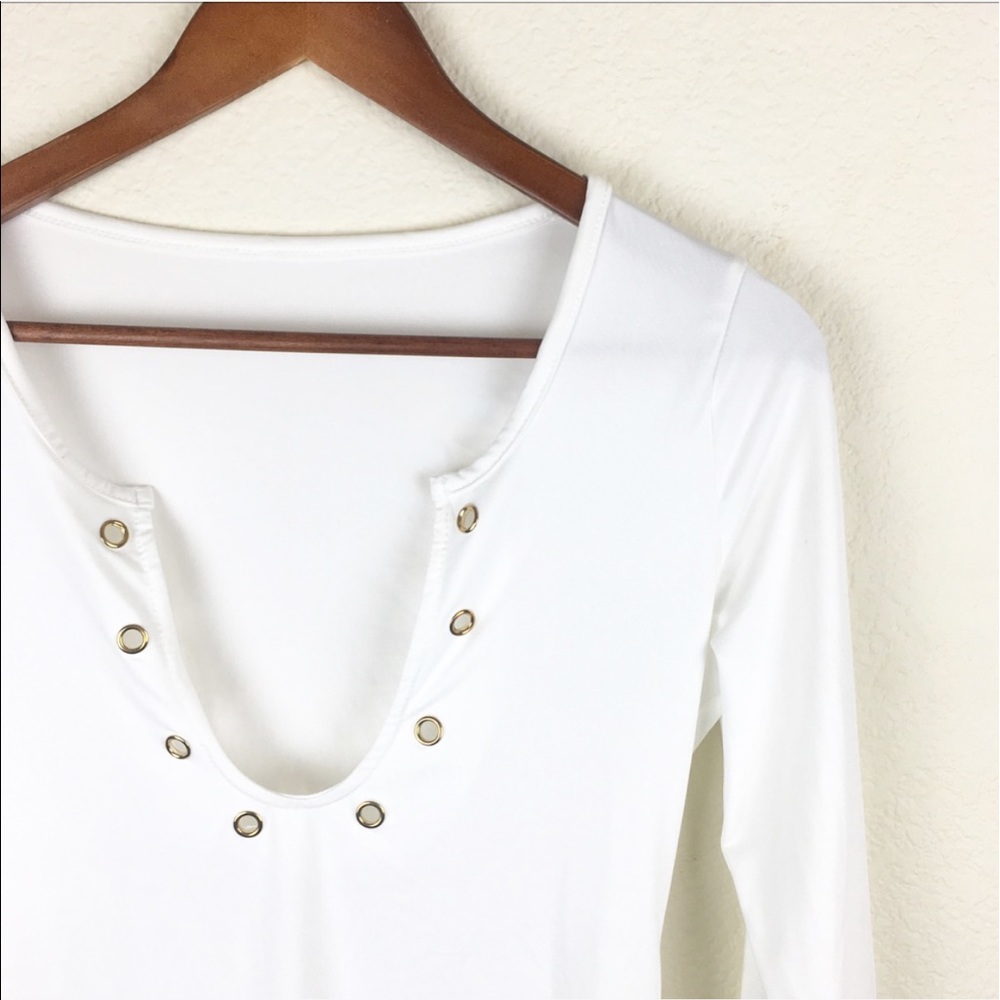 White Bodysuit with Gold Rings Surrounding U-Neck