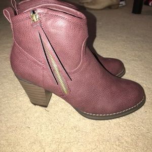 Purple ankle booties. Never worn.
