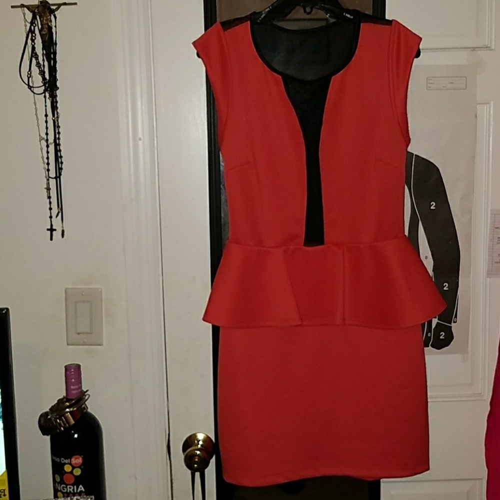 Coral and black peplum dress