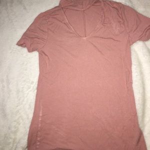 A pink shit that shows the chest Area!