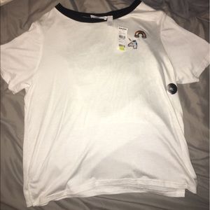 White & black tee with unicorn & rainbow patches