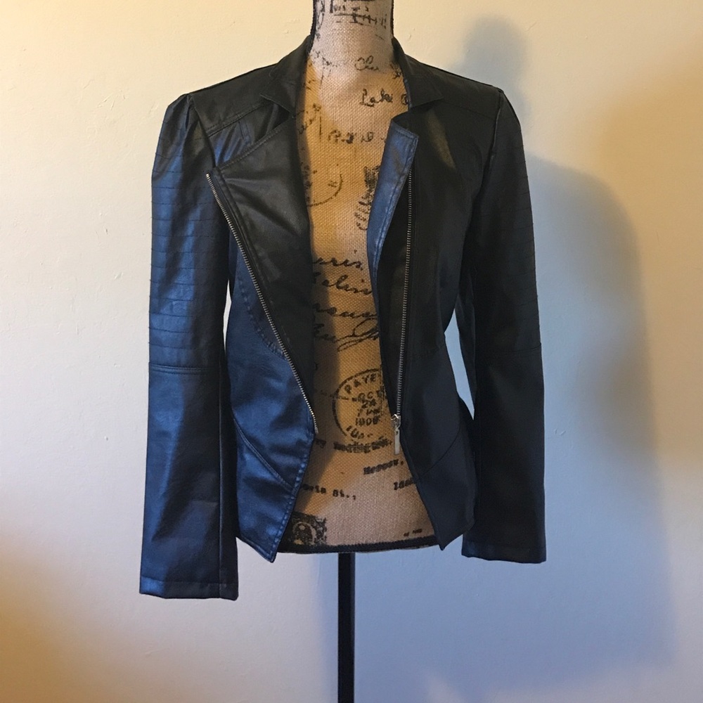 Black leather jacket with a gold zipper