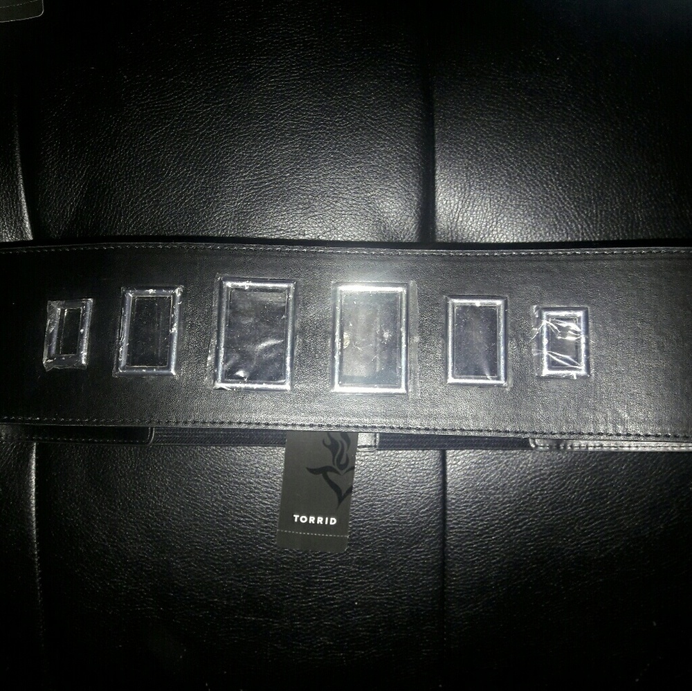 Torrid snap back belt