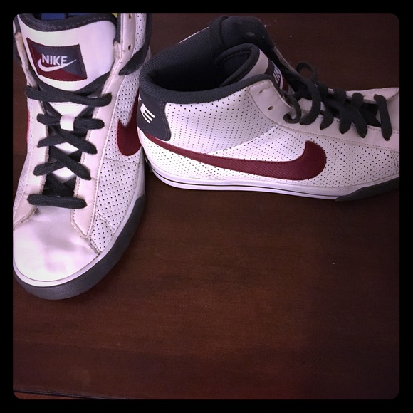 white nikes with red