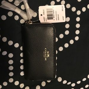 SALE SALE!!! NWT double zipper wallet. No damages.