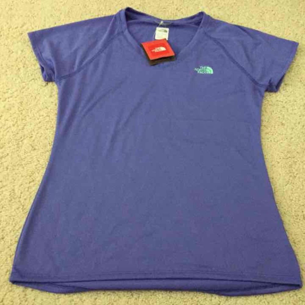 The North Face women reaxion amp v neck tee sz M.