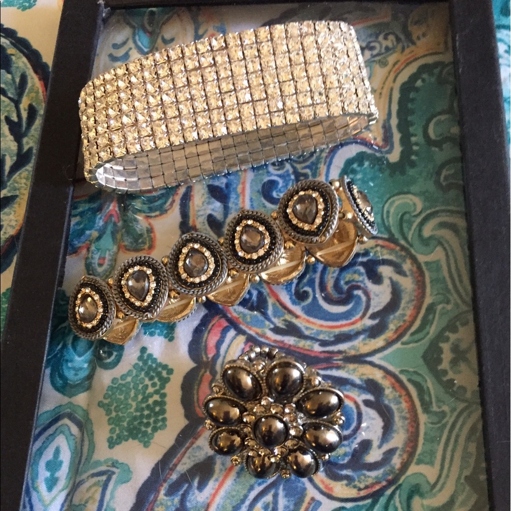 2 blingy bracelets and one black stone ring