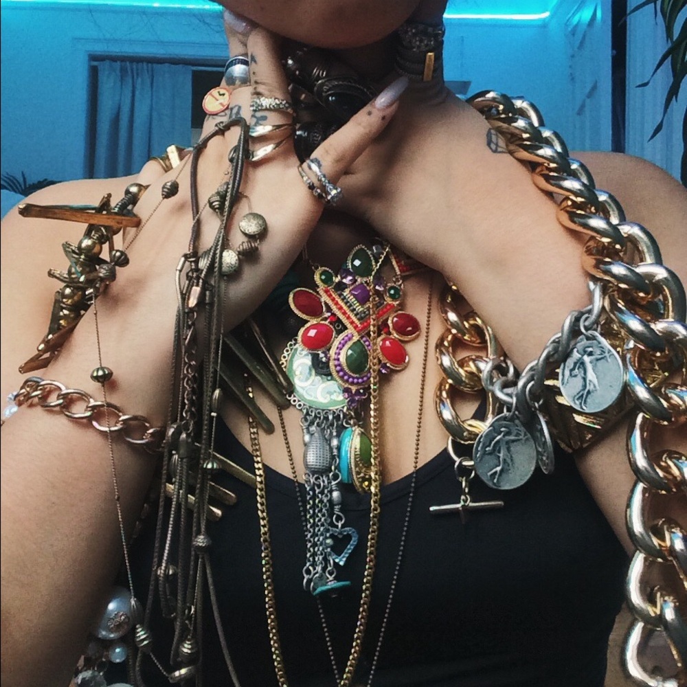 A box of jewelry necklace bracelet ring statement