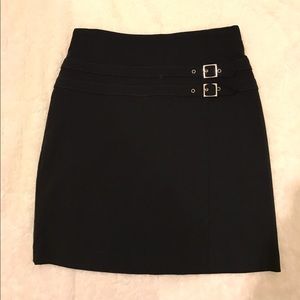 White House Black Market black skirt with buckles