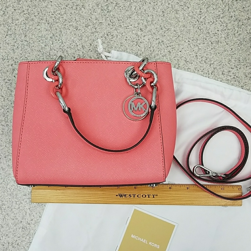 Michael Kors small handbag. Coral / pink / peach