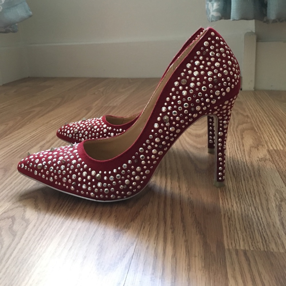 Red spiked stiletto heels