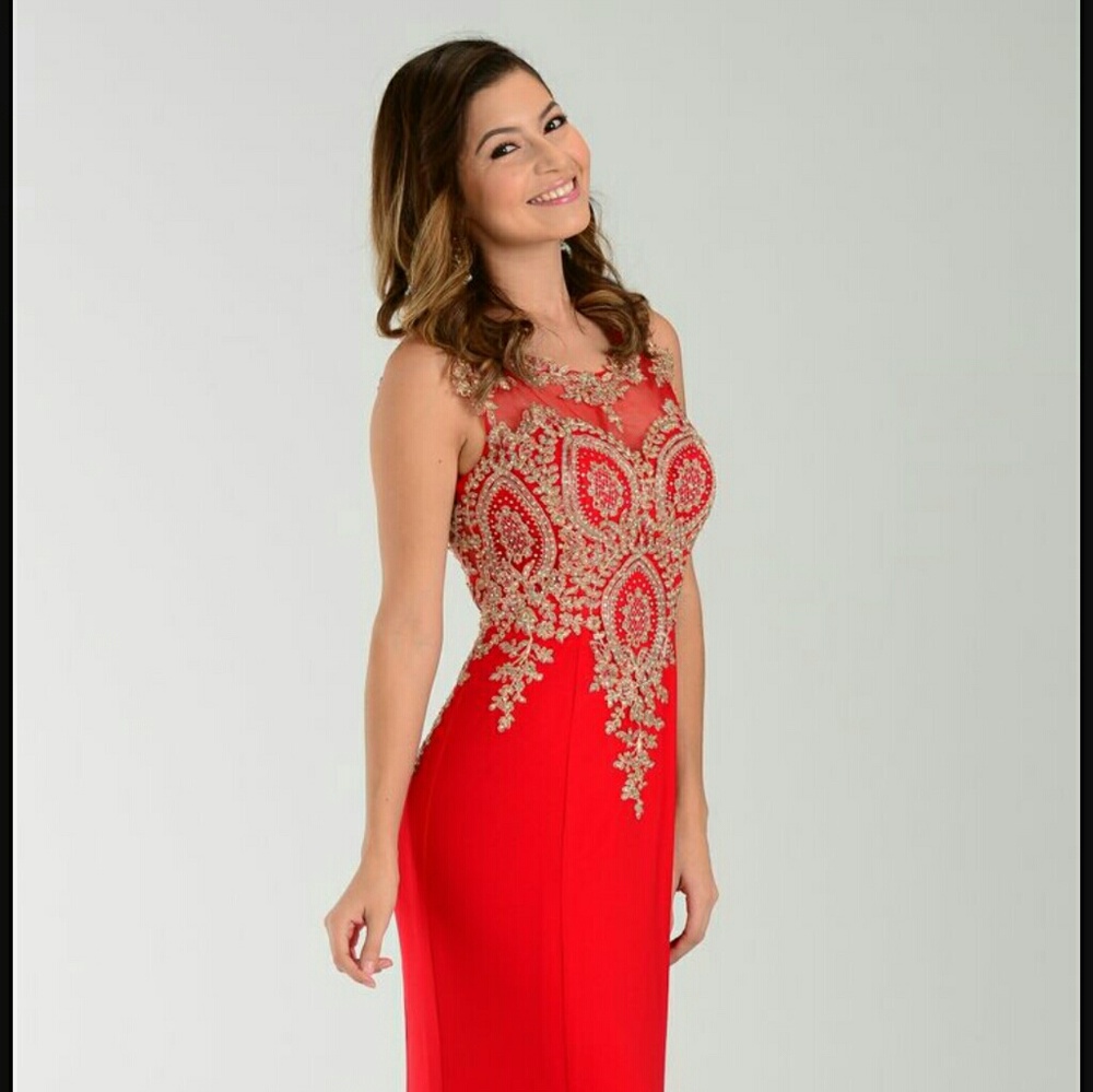 Beautiful Red and Gold gown. Fits like medium