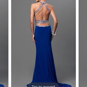 A blue PROM DRESS OR FORMAL DRESS