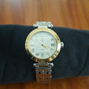 Ladies stylish Guess silver and gold tone watch