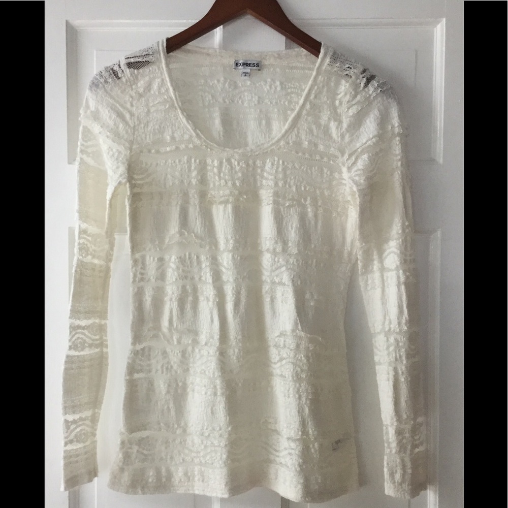 Beautiful Express cream stretch lace top.