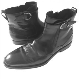 Salvatore Ferragamo with silvertone buckle.