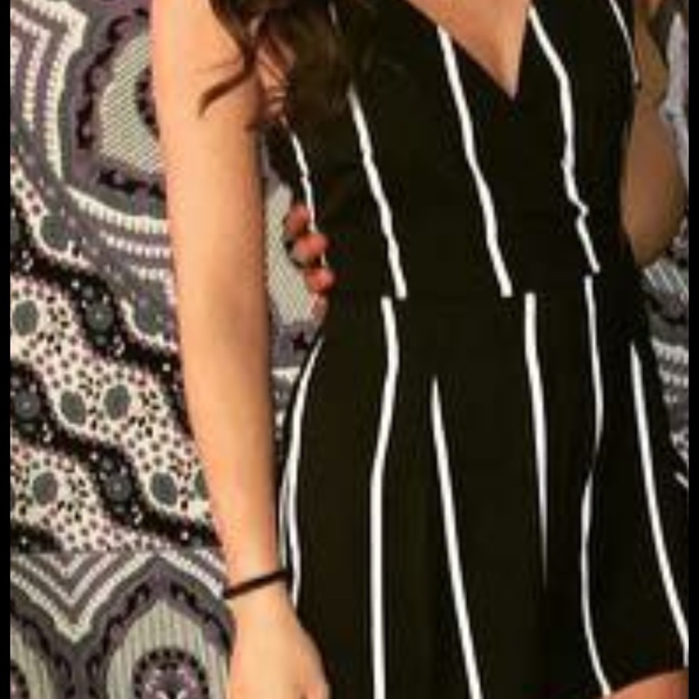 Black romper with white stripes