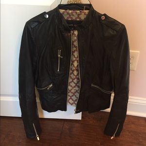 Real black leather jacket.