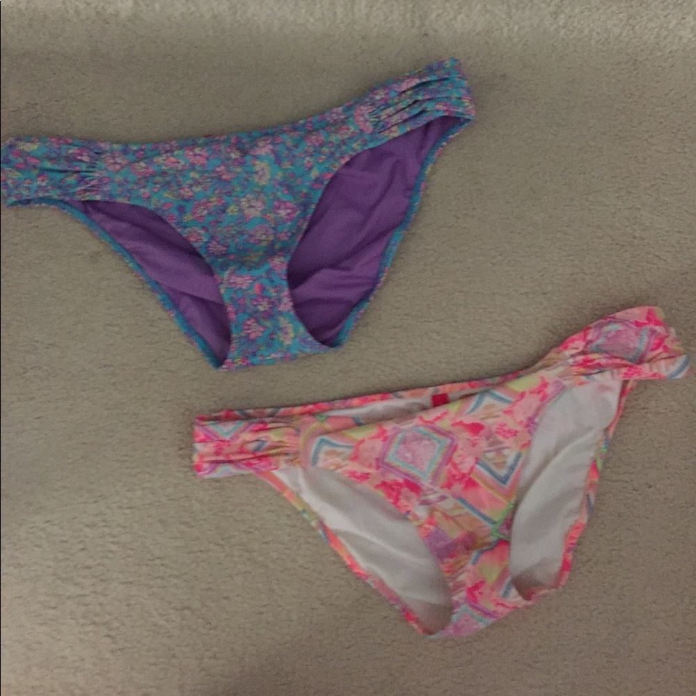 Two Victoria secret bikini bottoms.