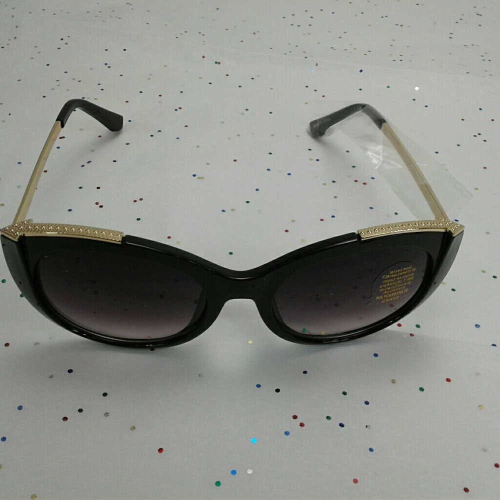 black cat eye sunglasses golden arrows and arms